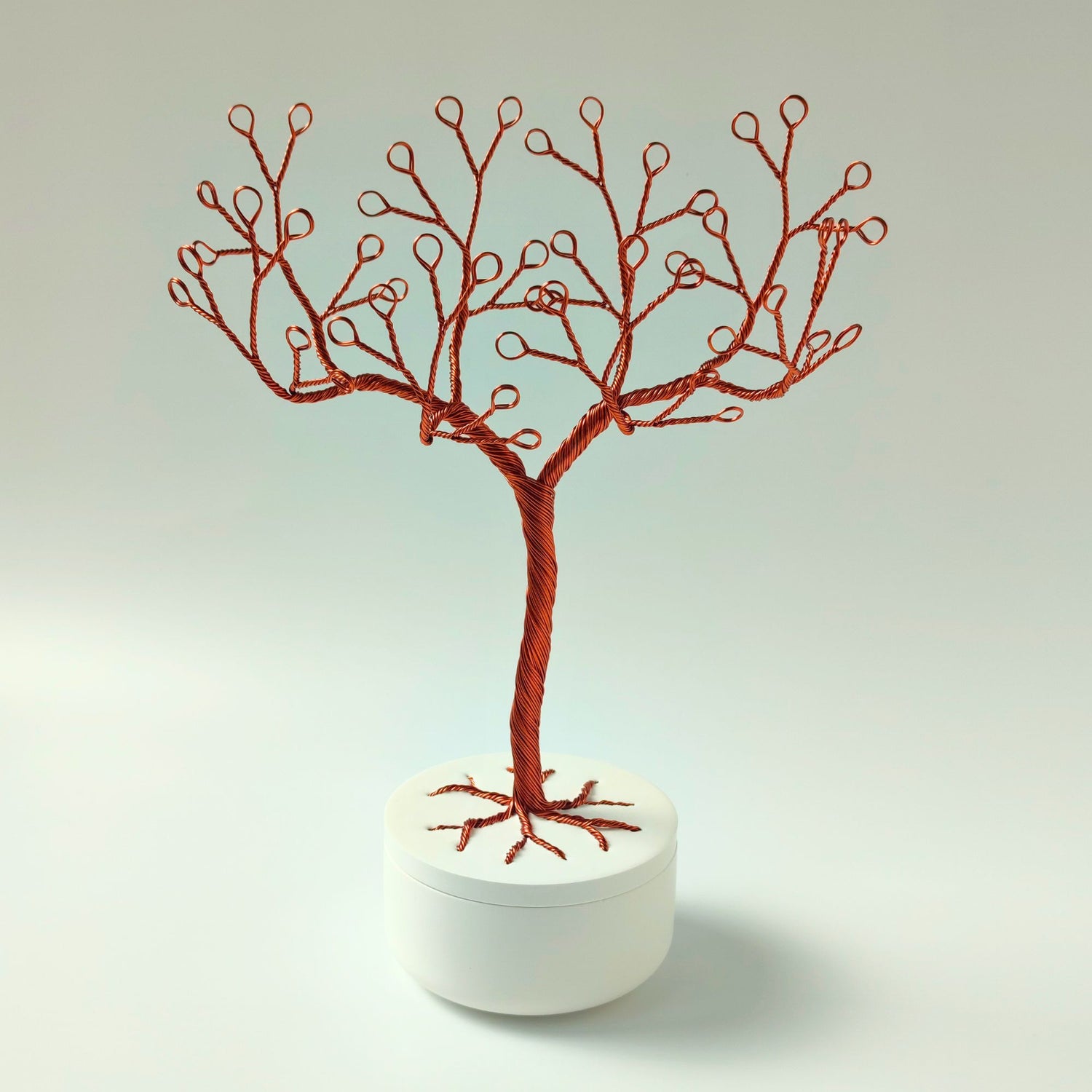 Handmade copper wire jewelry holder with ceramic bowl, empty