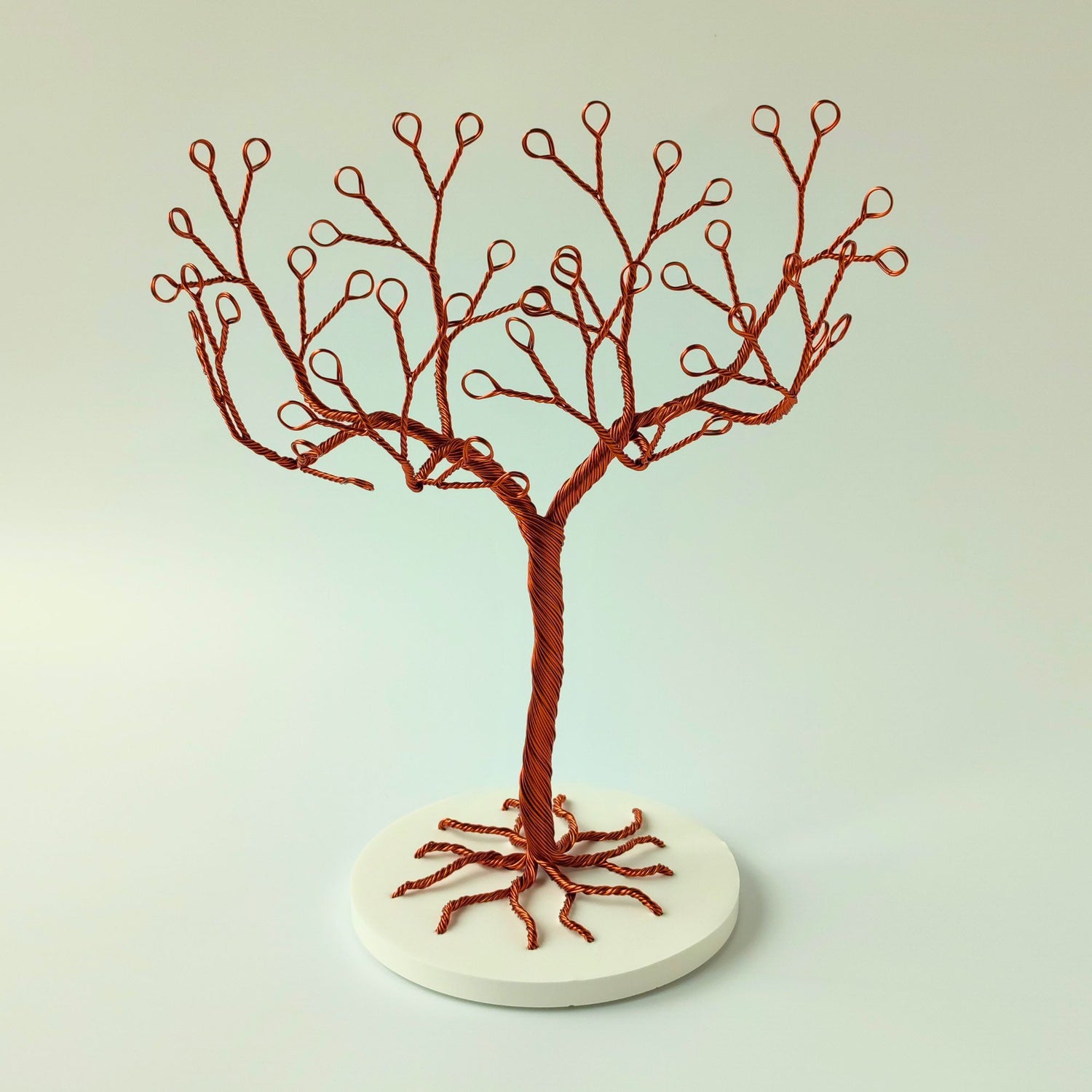 Handmade copper jewelry holder with flat ceramic tray