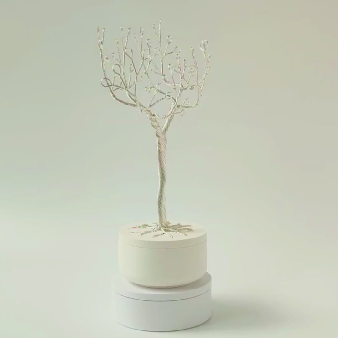 360° video of handmade silver jewelry tree with ceramic bowl
