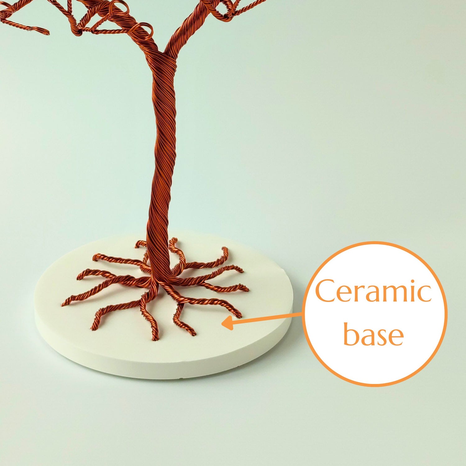 Jewelry organizer with stable ceramic tray and copper wire trunk