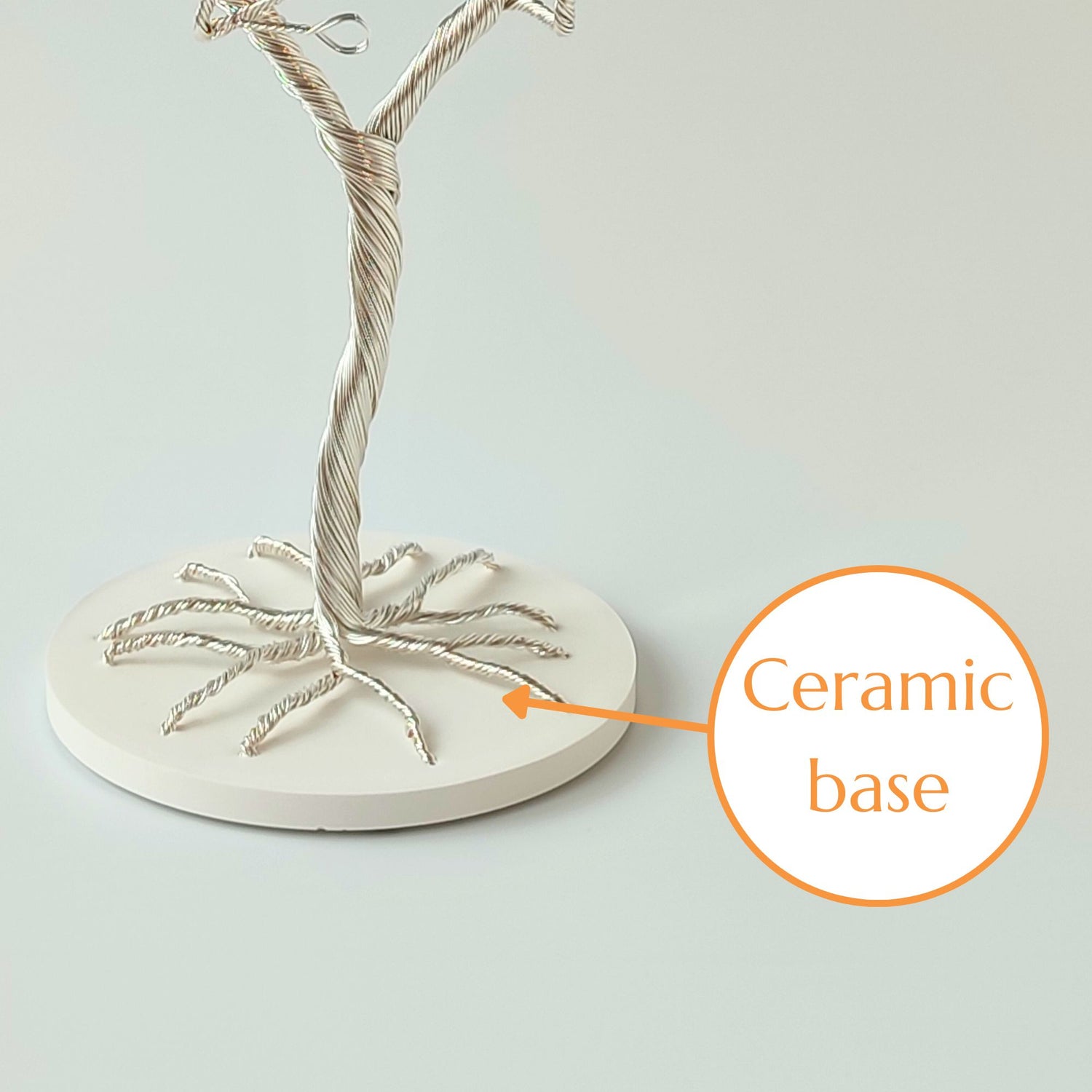 Jewelry organizer with stable ceramic tray and silver plated wire trunk