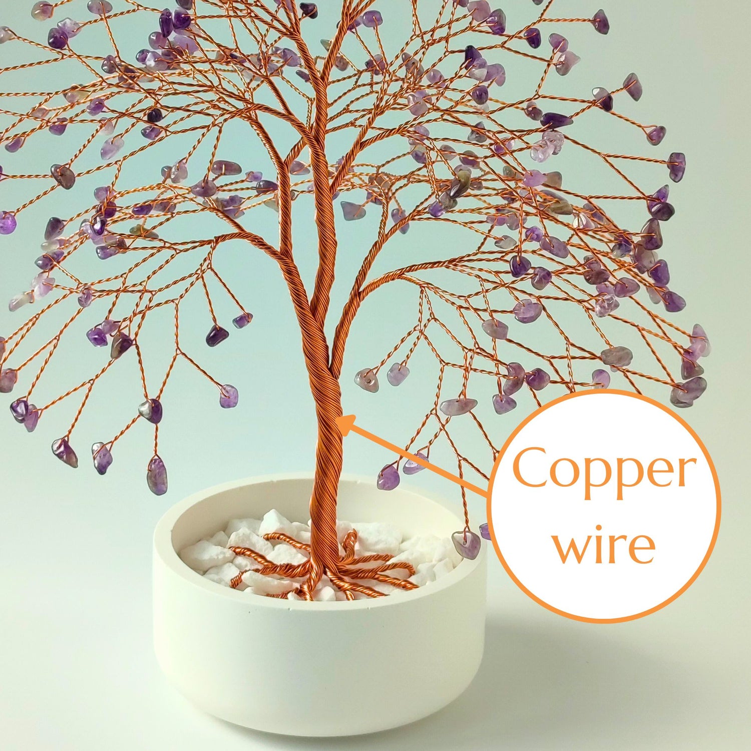 Strong copper wire trunk of handmade amethyst crystal gemstone large tree – close-up detail