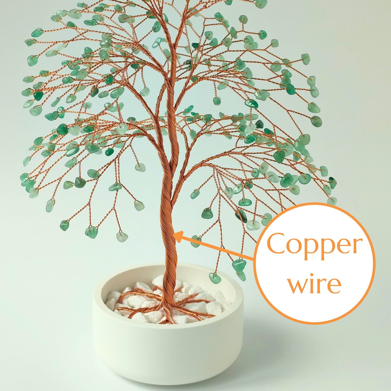 Strong copper wire trunk of handmade green aventurine gemstone large tree – close-up detail