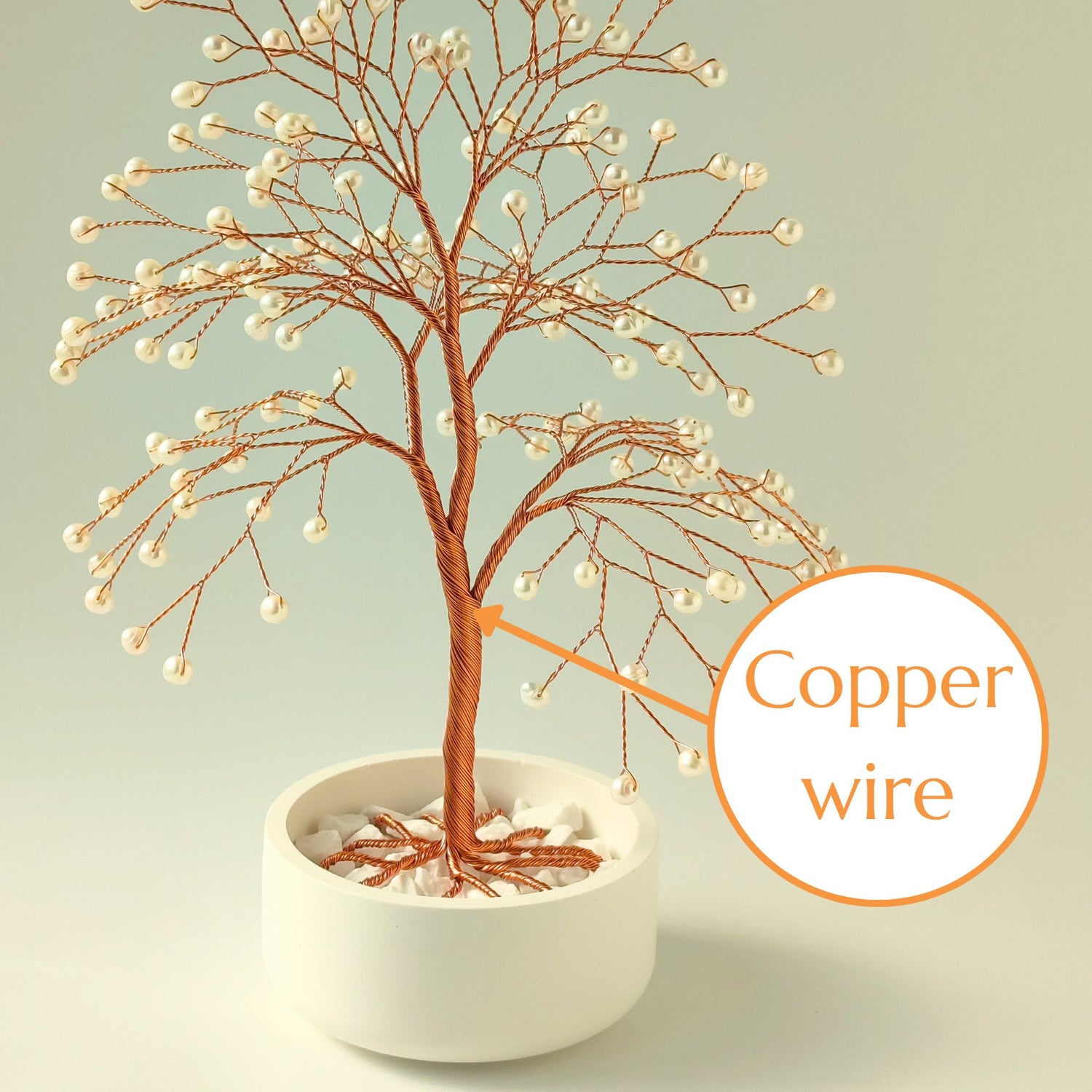 Strong copper wire trunk of handmade pearl jewelry large tree – close-up detail