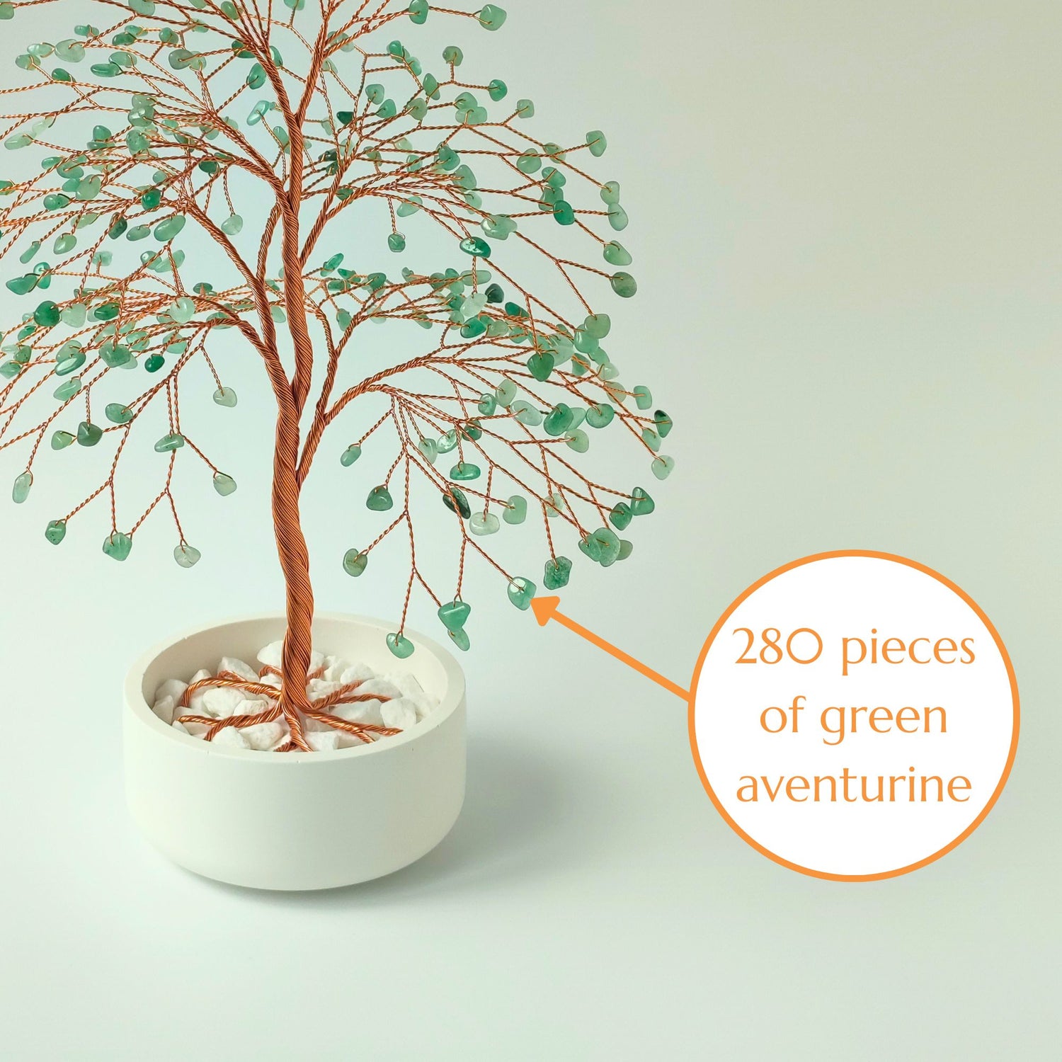 Close-up of copper wire branch with 280 natural green aventurine gemstone – elegant detail