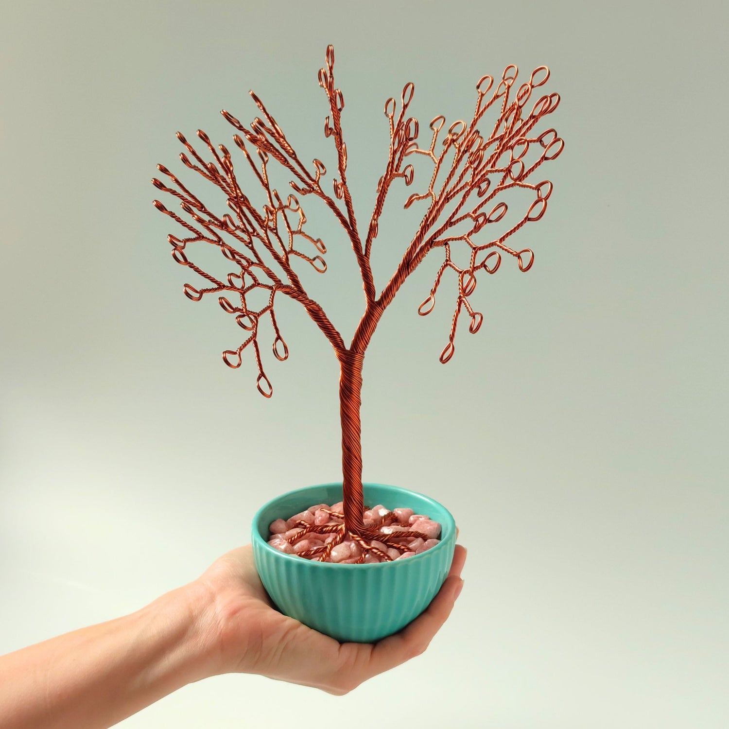 Size reference: copper jewelry tree in turquoise bowl