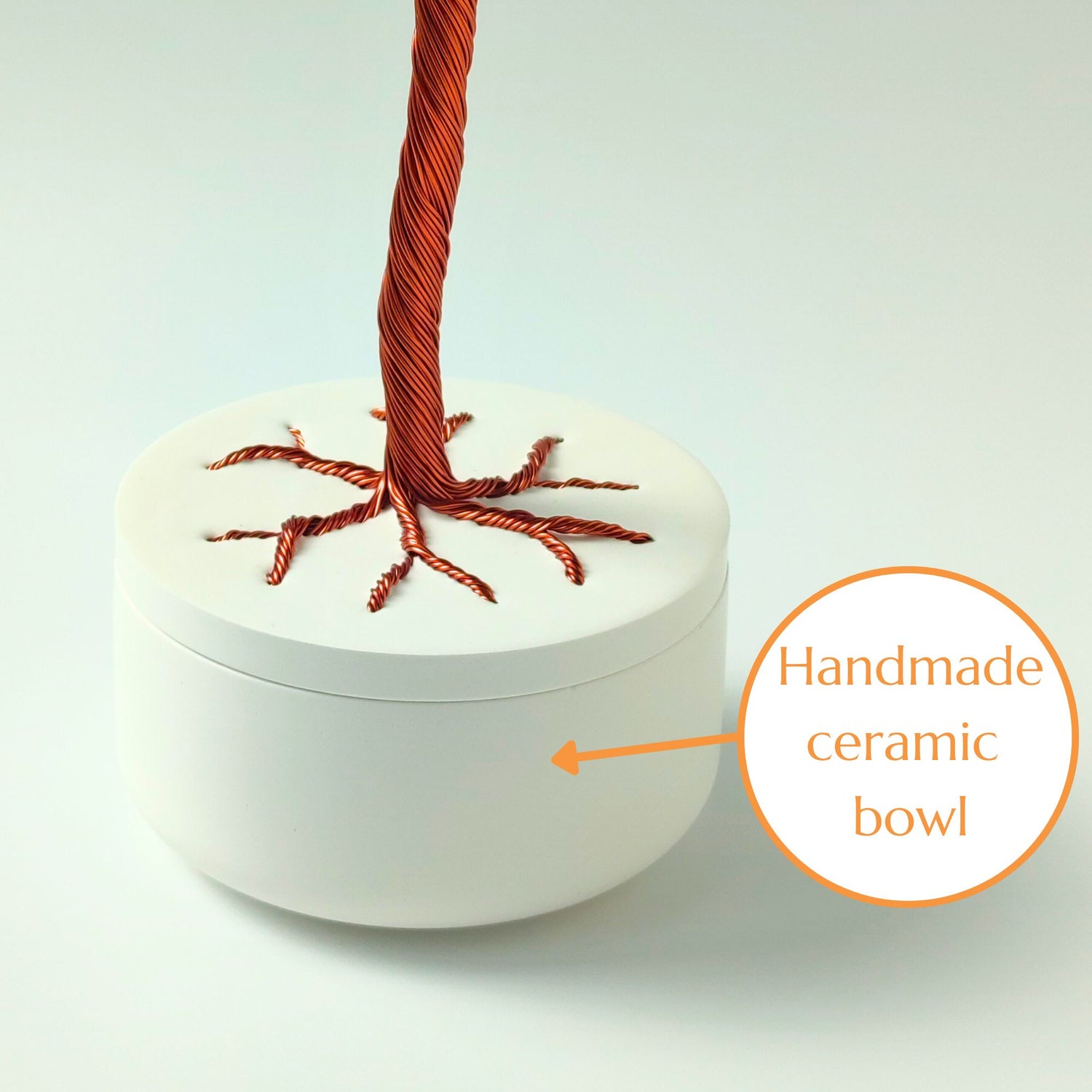 Glossy white ceramic jewelry bowl handmade in Transylvania