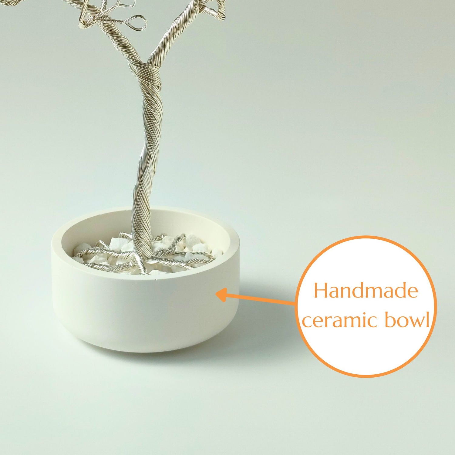 Glossy white ceramic silver jewelry bowl with decorative stones handmade in Transylvania