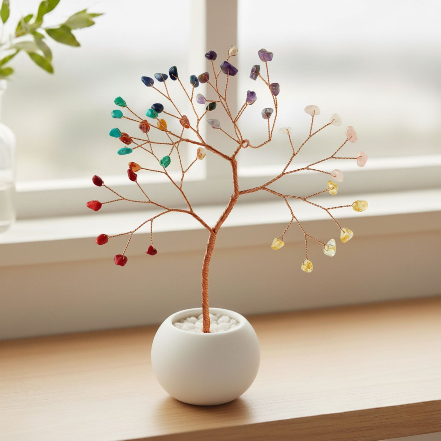 Small copper wire chakra tree with gemstone beads in ceramic bowl – handmade decorative art