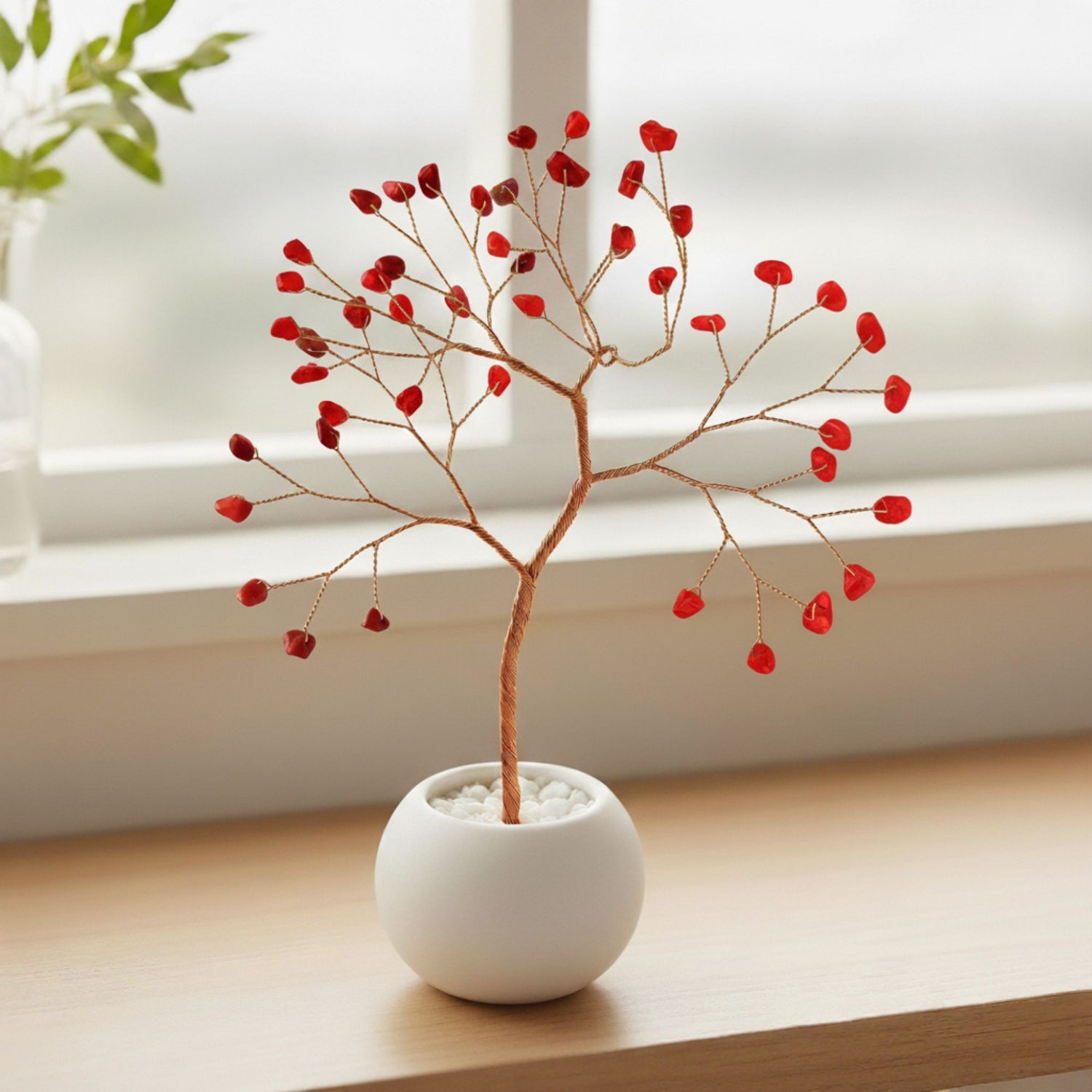 Small copper wire coral tree with red gemstone beads in ceramic bowl – handmade decorative art