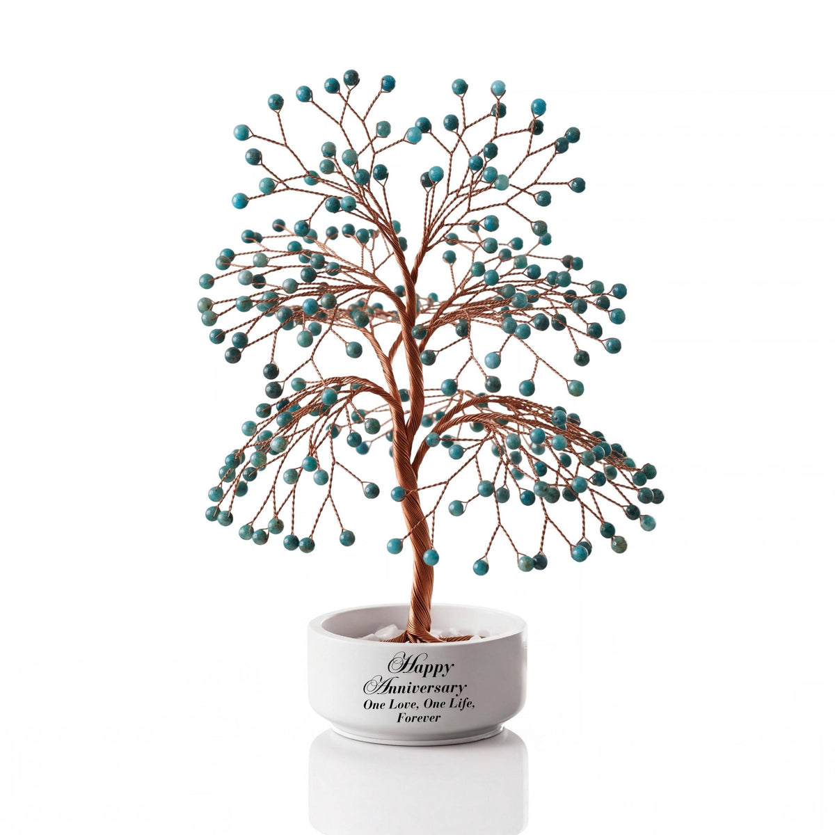 Large handmade wire Tree of Life with polished teal blue apatite spheres on copper wire, in a white round bowl printed with Happy Anniversary One Love, One Life, Forever