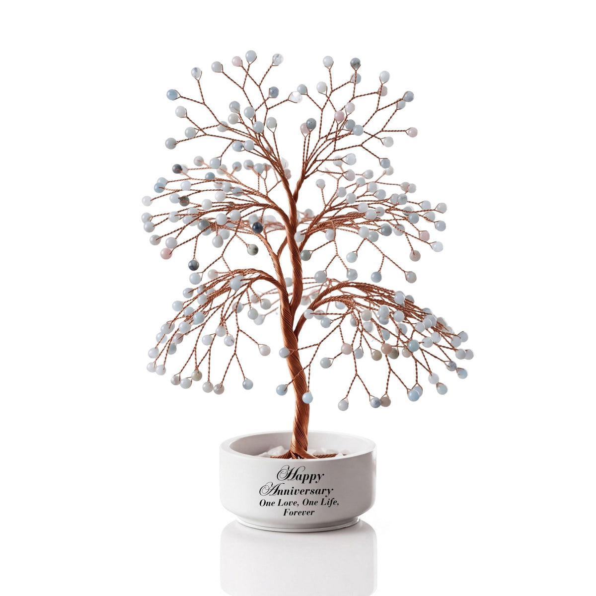 Large handmade wire Tree of Life with polished pale sea glass blue aquamarine spheres on copper wire, in a white round bowl printed with Happy Anniversary One Love, One Life, Forever