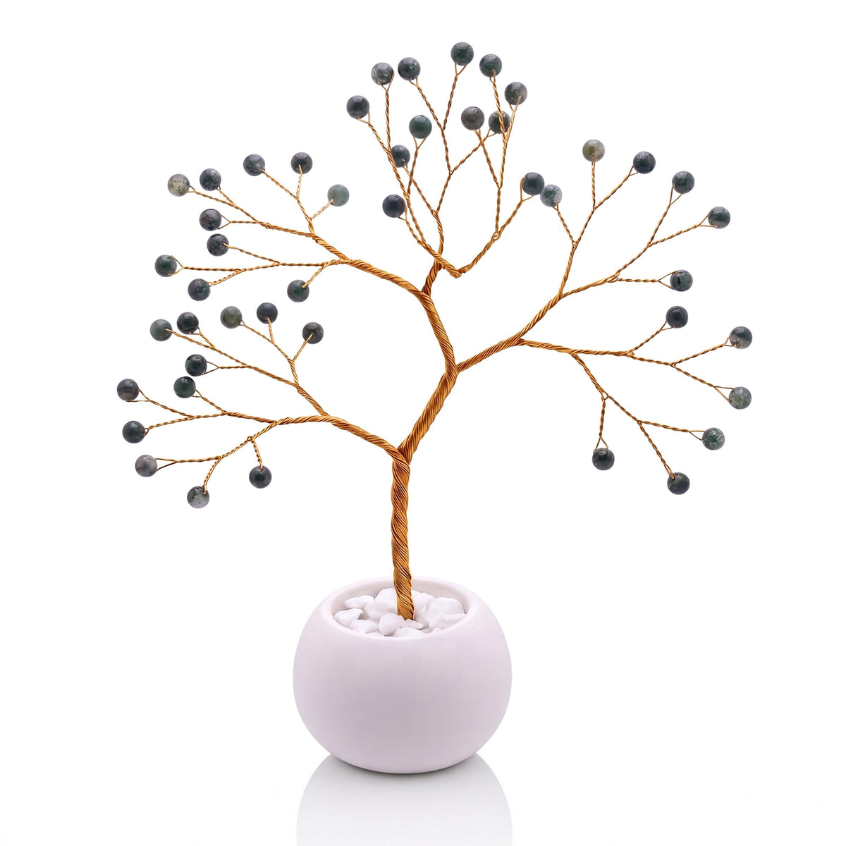 Gold-plated wire tree with polished deep forest green moss agate beads in a white bowl with white pebbles