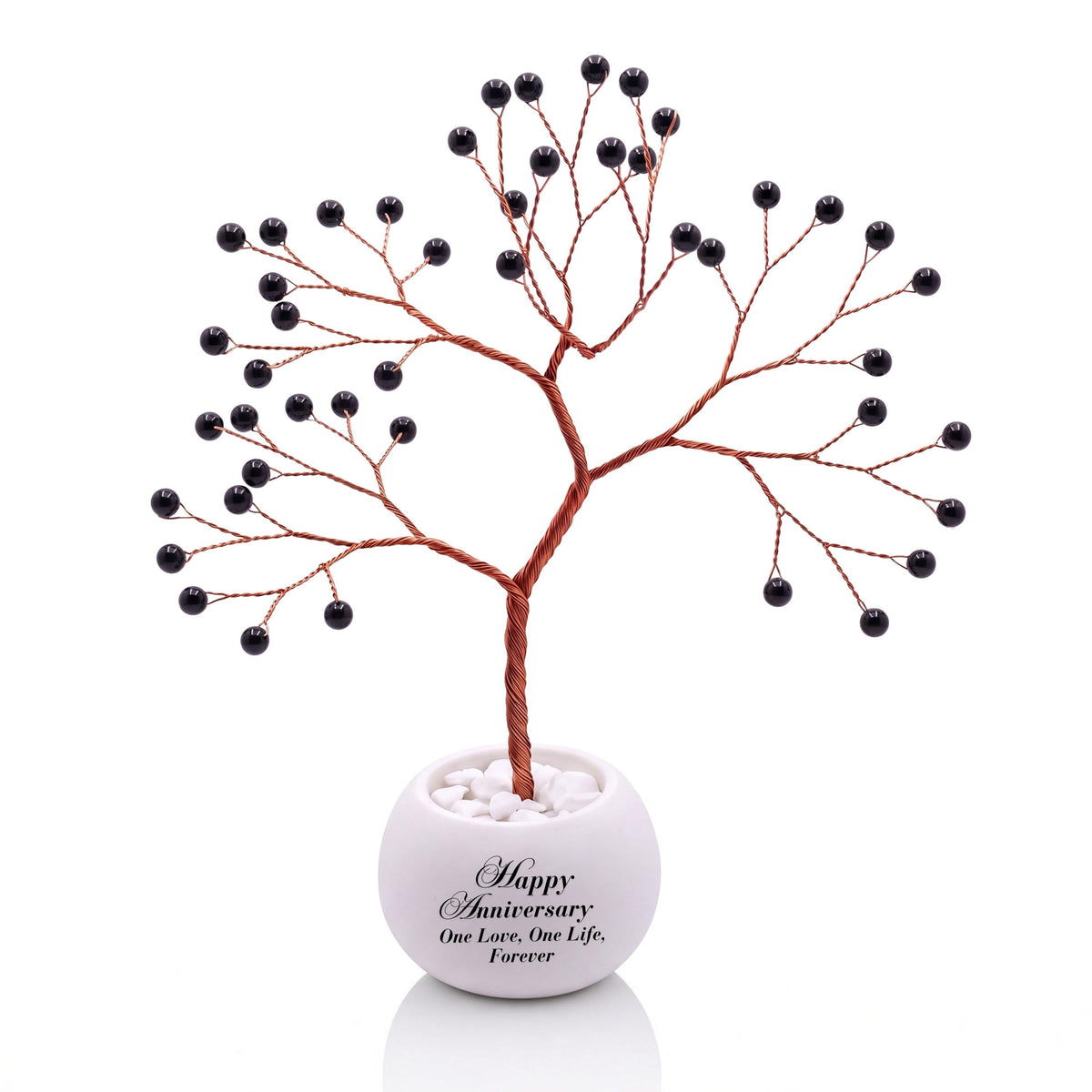 Small handmade wire Tree of Life with polished glossy black obsidian beads on copper wire, in a white round bowl printed with Happy Anniversary One Love, One Life, Forever