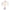 Gold-plated wire tree with polished rhubarb pink and sage green tourmaline beads in a white bowl with white pebbles