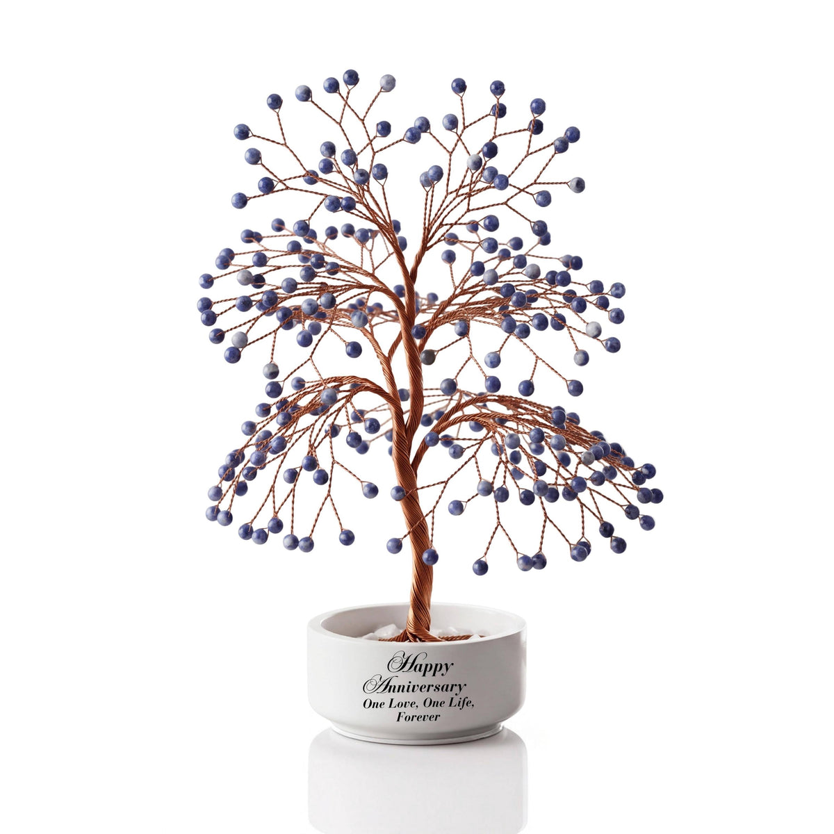 Large handmade wire Tree of Life with polished deep royal blue sodalite spheres on copper wire, in a white round bowl printed with Happy Anniversary One Love, One Life, Forever
