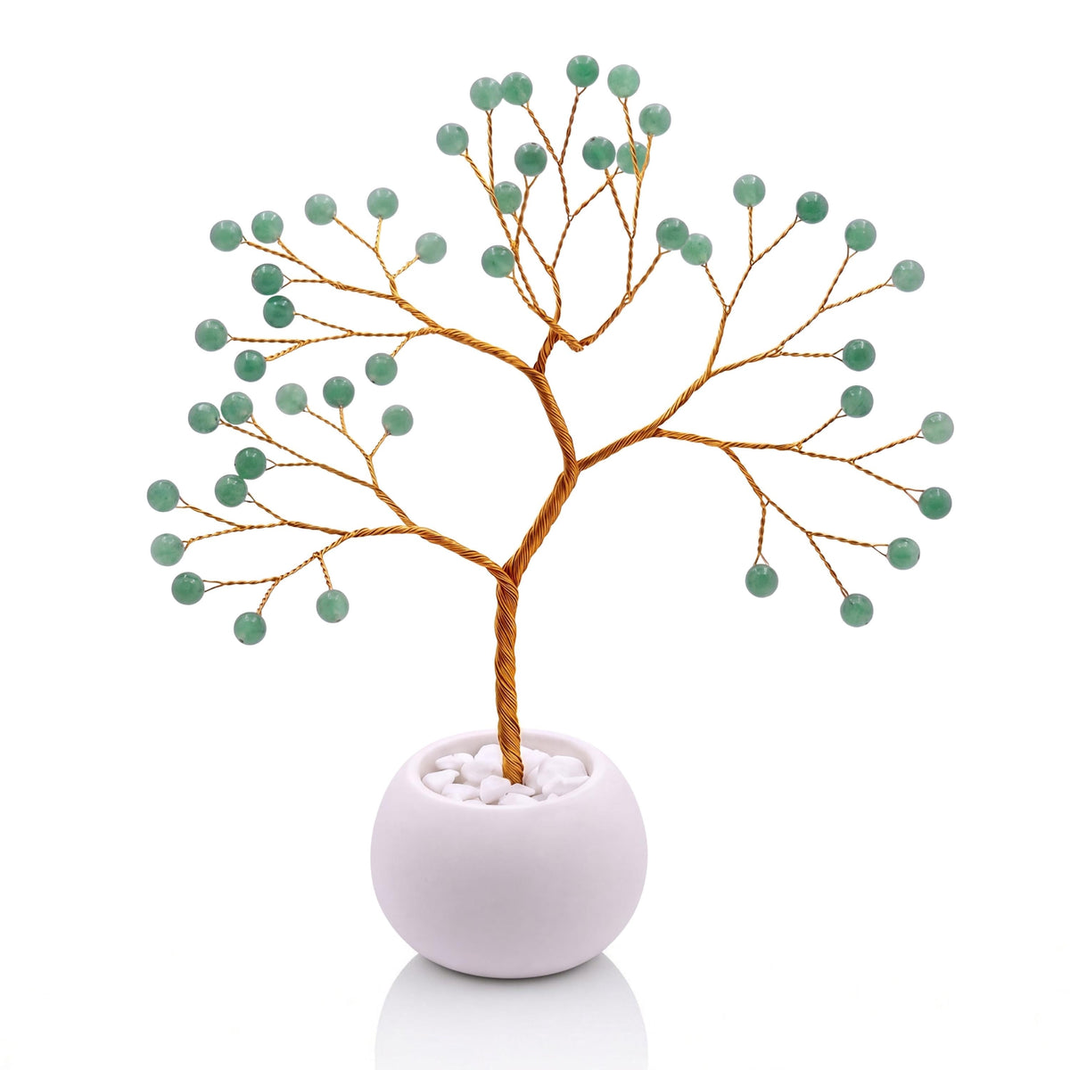 Gold-plated wire tree with polished sage green aventurine beads in a white bowl with white pebbles