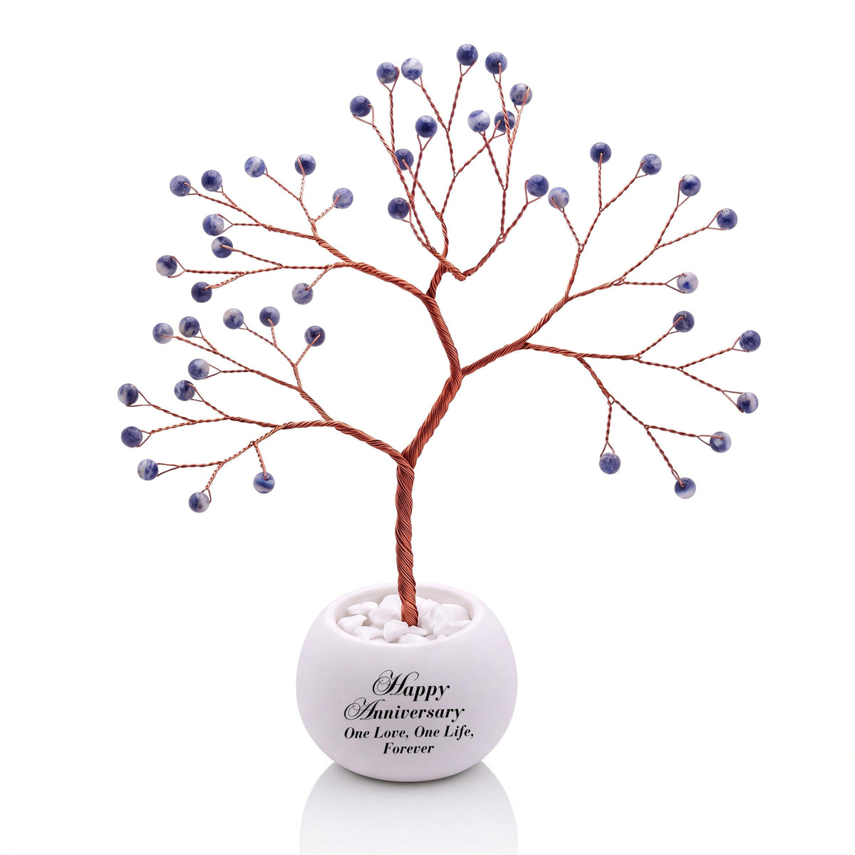 Small handmade wire Tree of Life with polished denim blue sodalite beads with white veining on copper wire, in a white round bowl printed with Happy Anniversary One Love, One Life, Forever