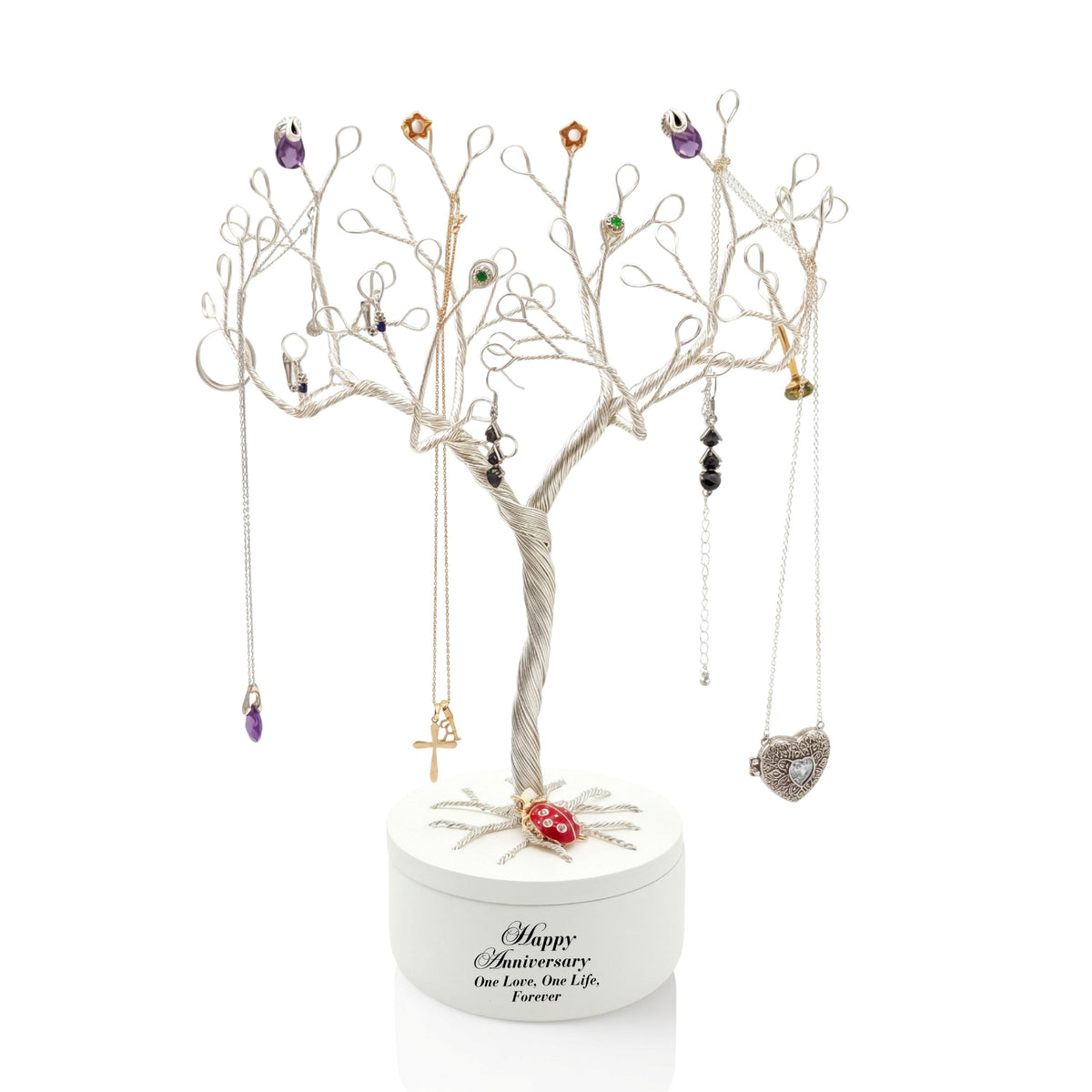 Silver wire jewelry tree in a white lidded anniversary bowl with colorful pendants