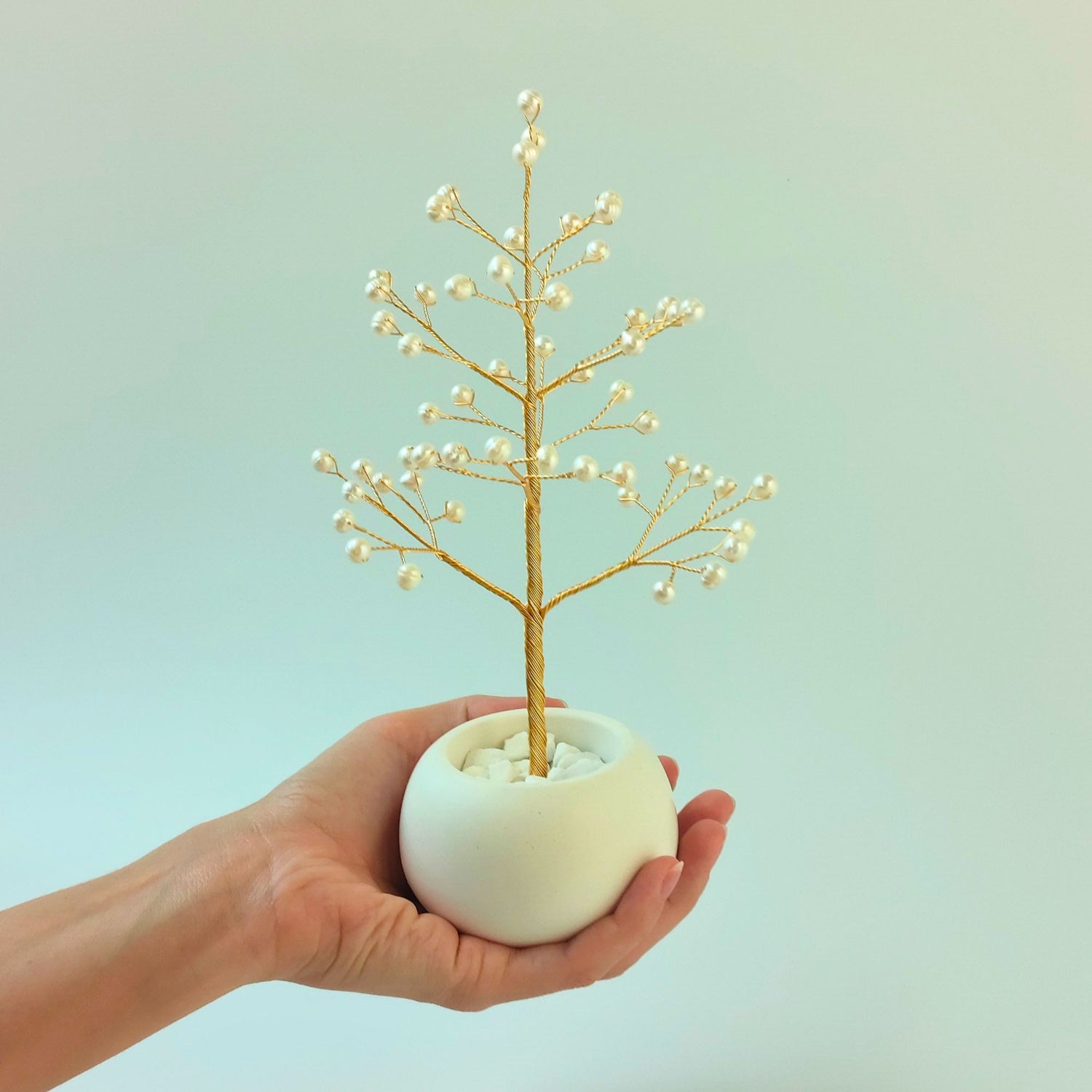 Pearl Christmas Tree held in hand to show scale – gilt wire & freshwater pearls