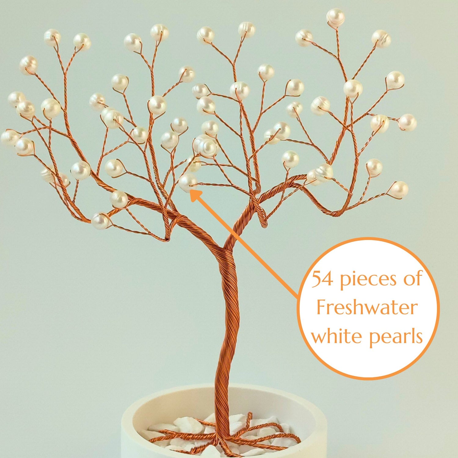 Close-up of copper wire branch with 54 natural freshwater pearls – elegant detail