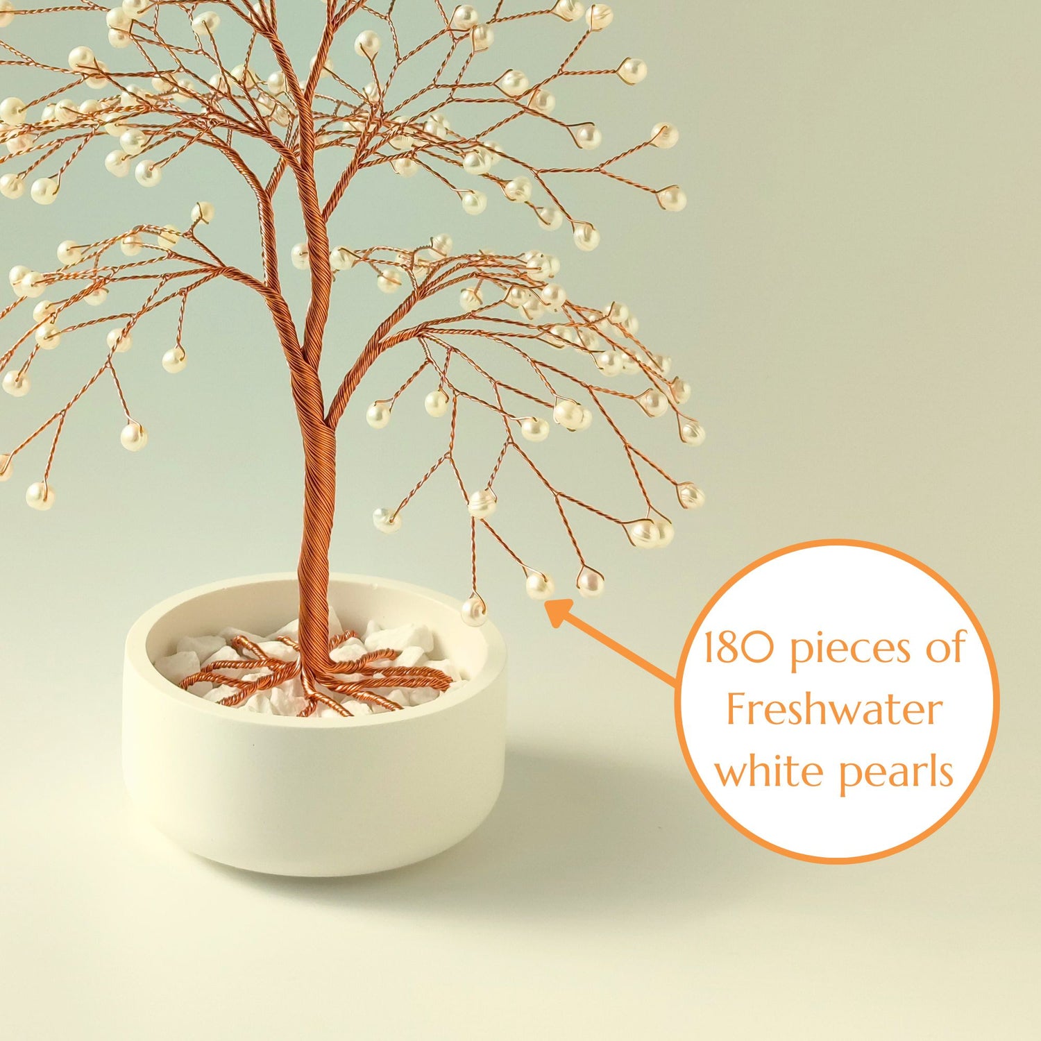 Close-up of copper wire branch with 180 natural freshwater pearls – elegant detail