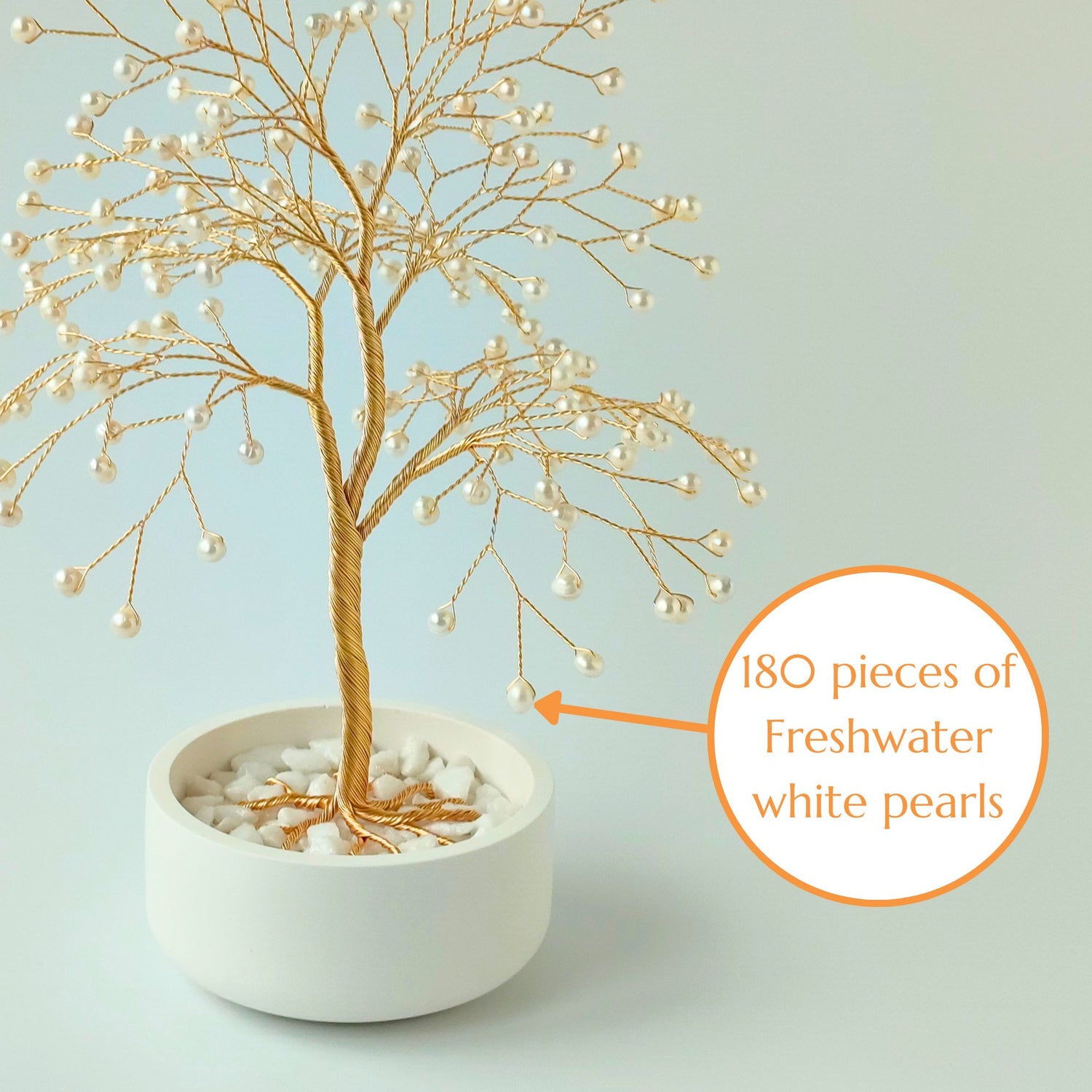 Close-up of gold wire branch with 180 natural freshwater pearls – elegant detail