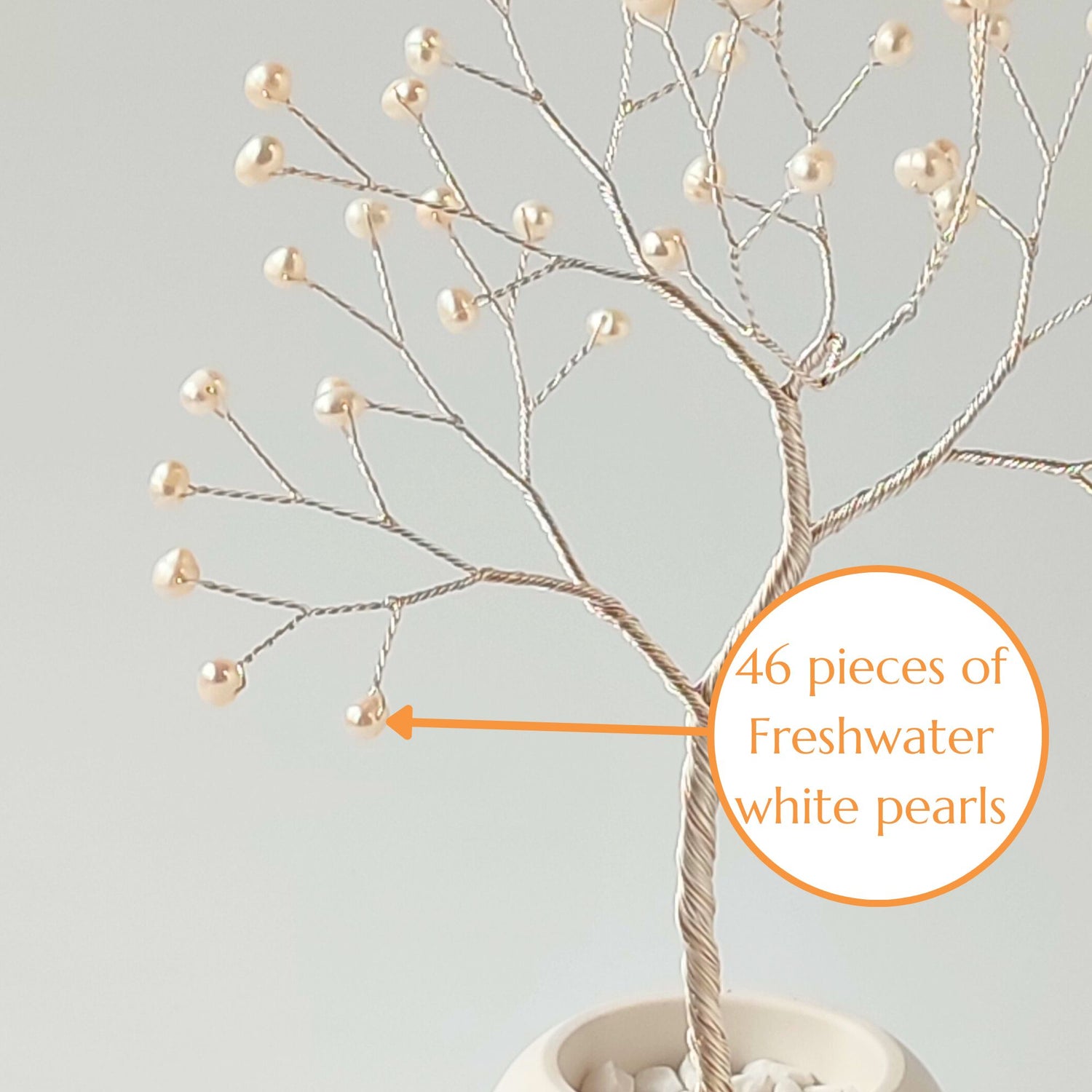 Close-up of silver wire branch with 46 natural freshwater pearls – elegant detail