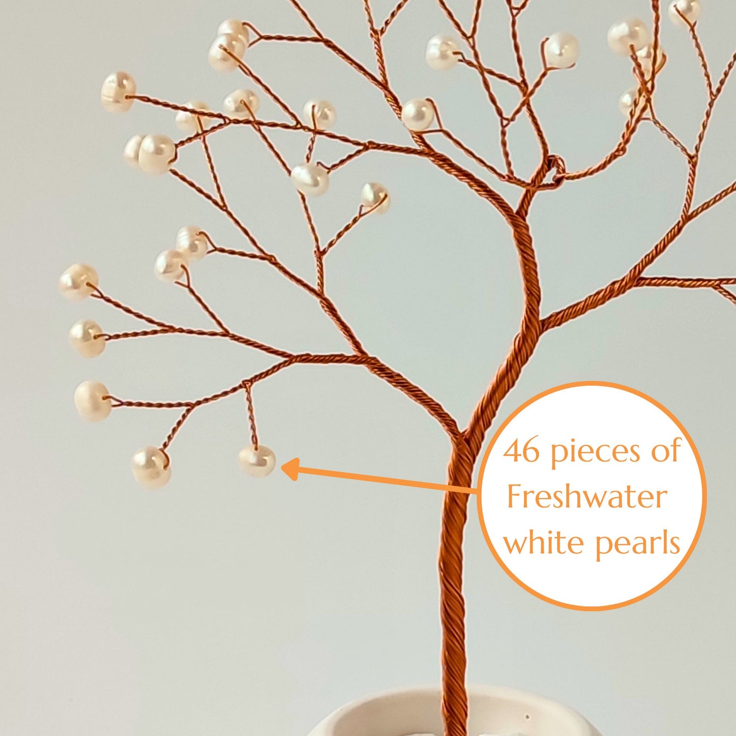 Close-up of copper wire branch with 46 natural freshwater pearls – elegant detail