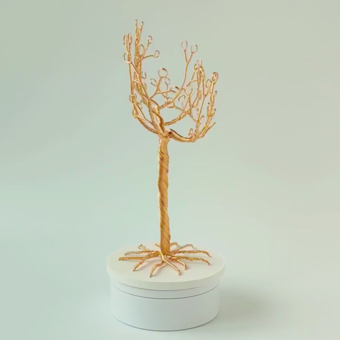 360° video of handmade gold jewelry tree with tray