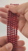 Video of strands of red coral beads used for this tree, held in the hand