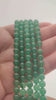Video of strands of sage green aventurine beads used for this tree, held in the hand