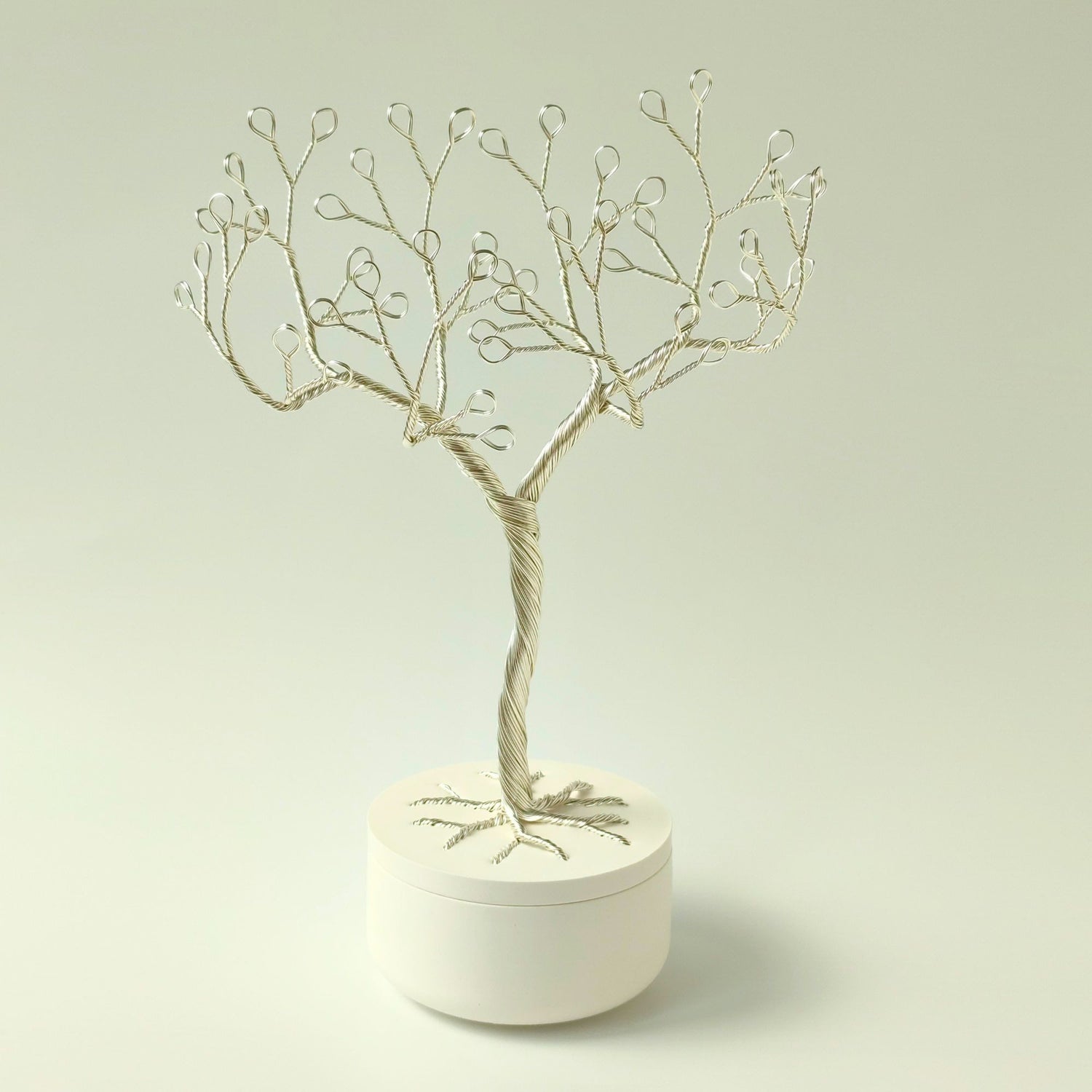 Handmade silver wire jewelry holder with ceramic bowl, empty